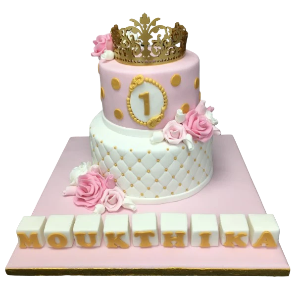 Bespoke Princess Baby Crown cake with pastel pink icing and gold accents, crafted in Solihull, West Midlands.