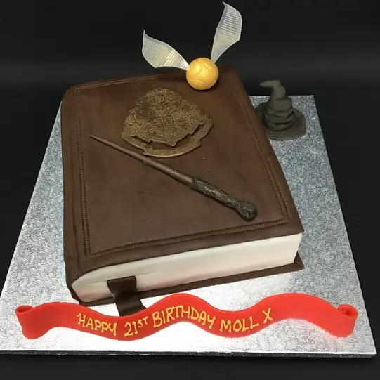 Bespoke Harry Potter closed book cake with detailed cover design, crafted for a celebration in Solihull, West Midlands.