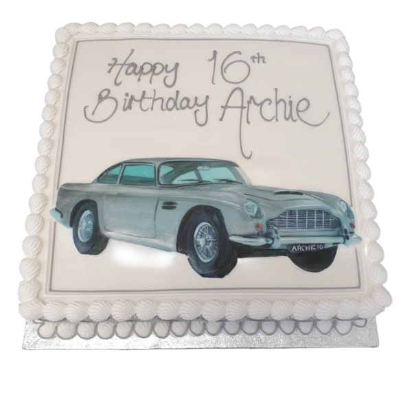 A luxury car-shaped cake designed as an Aston Martin DB5, perfect for car enthusiasts and special occasions with a unique and detailed design.