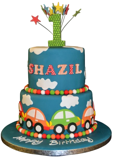 Bespoke cake with simple car and shooting star designs in deep blue and gold, crafted in Solihull, West Midlands.