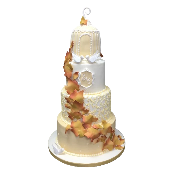Elegant multi-tiered wedding cake with sugar paste and autumn leaf decorations.