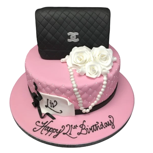 Bespoke cake shaped like a black Chanel clutch bag with quilted pattern and gold chain, Solihull, West Midlands.