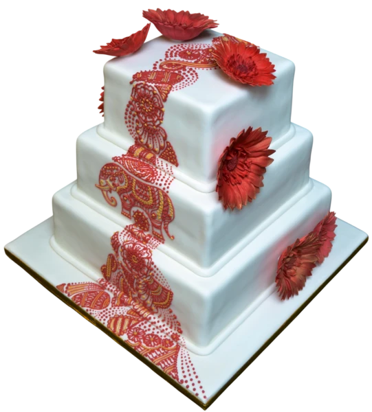Three-tier white wedding cake with red flowers and intricate sugar paste design.