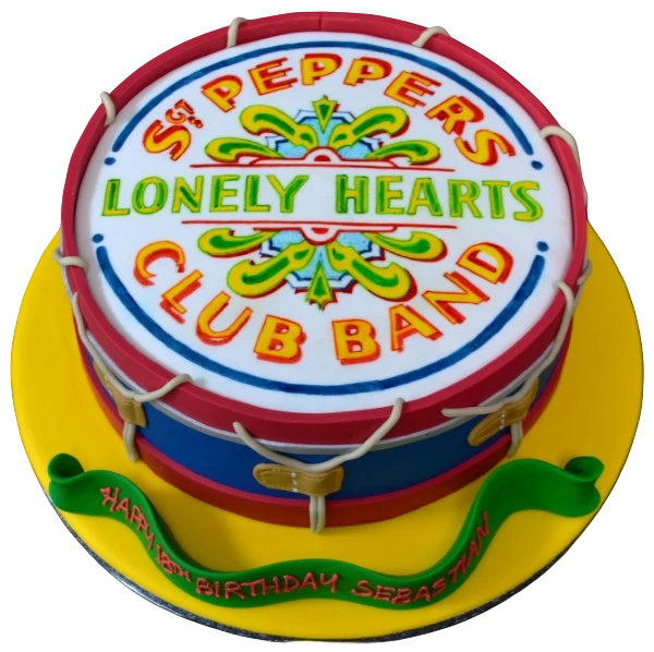 Bespoke celebration cake with colorful fondant decorations and intricate piping, crafted in Solihull, West Midlands.