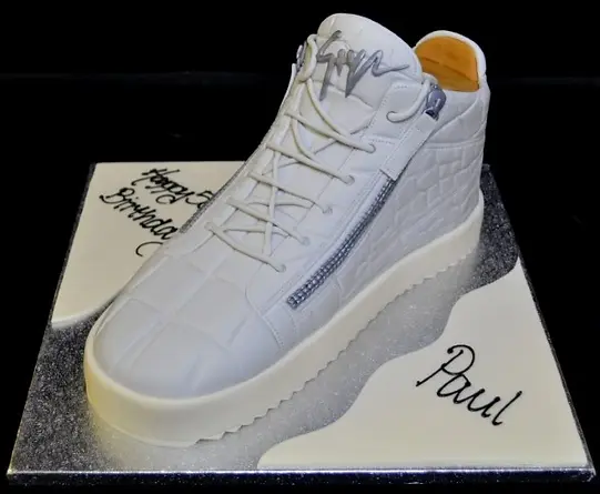 Bespoke Guiseppe Trainer cake with detailed fondant design, celebrating in Solihull, West Midlands.