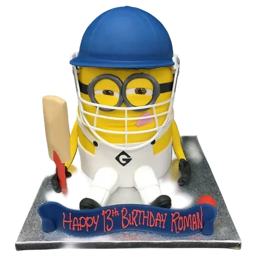 Bespoke cricketer Minion cake with detailed cricket gear, crafted for a celebration in Solihull, West Midlands.