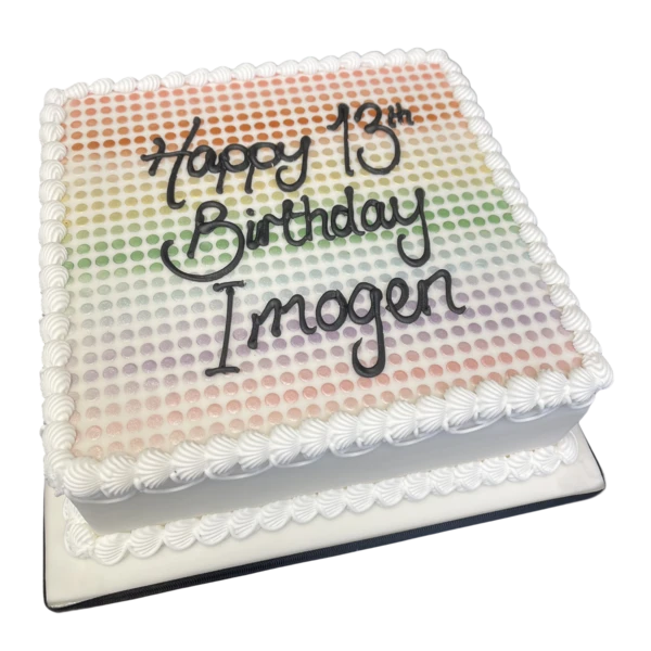 Bespoke spotty rainbow cake with vibrant multicolored dots, perfect for celebration in Solihull, West Midlands.