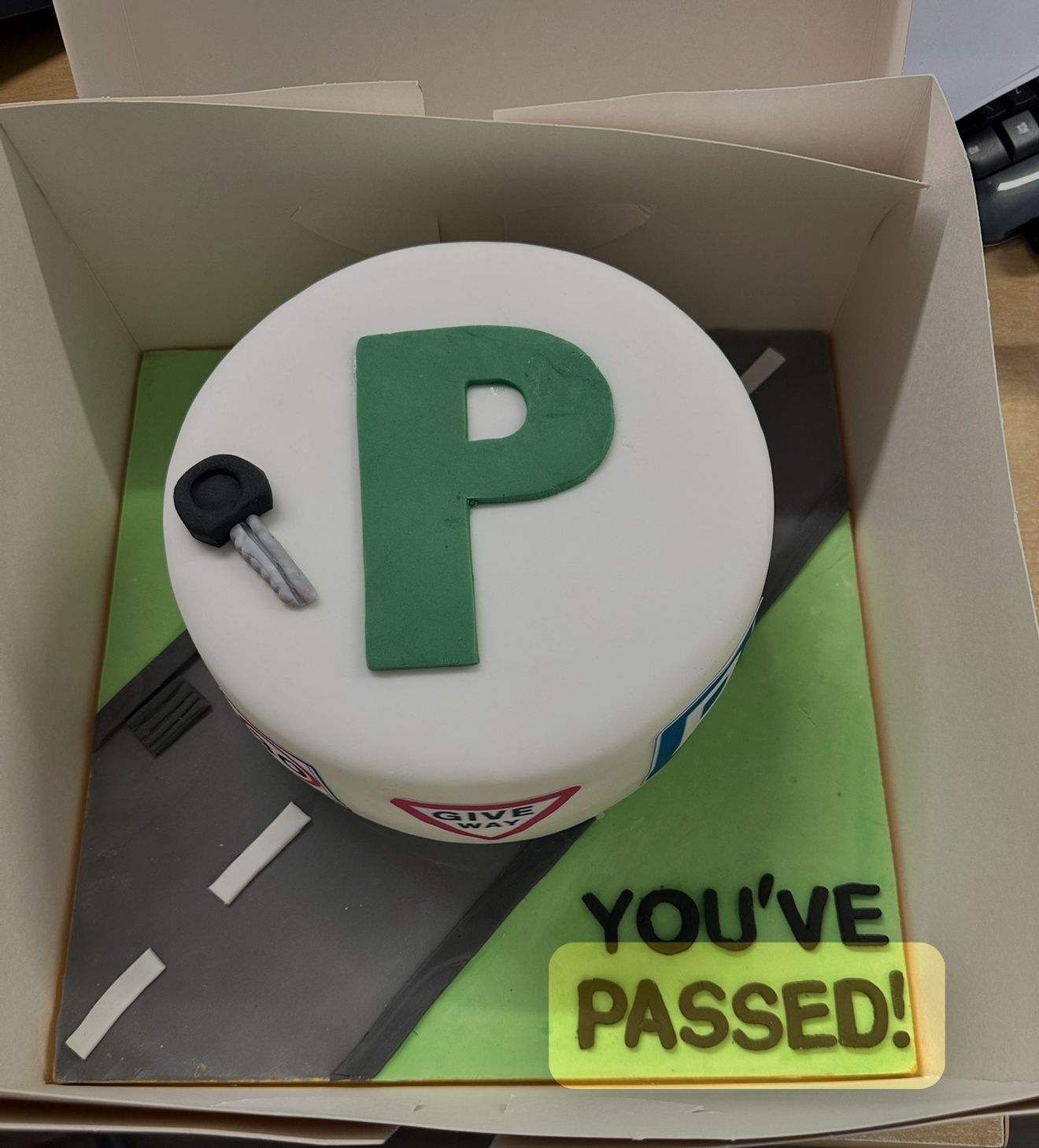 Bespoke cake with intricate floral icing and delicate piping, perfect for celebration in Solihull, West Midlands.