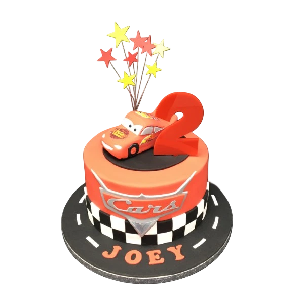 Red car-shaped cake decorated to look like Lightning McQueen from the movie "Cars". Perfect for a fan of the film or any car enthusiast.