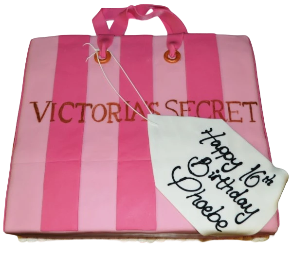 Bespoke cake shaped like a Victoria's Secret bag with pink fondant and detailed handles, Solihull, West Midlands.