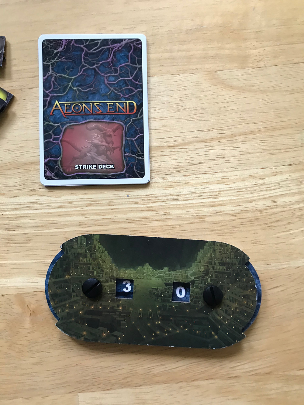 Aeon's End Rageborne strike deck and Gravehold life counter.