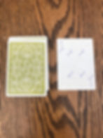 And the card back art . . . I love that they didn't just slap the game's logo on the back like most modern games. This design is beautiful, elegant, and maeks you think you're playing a classic card game.