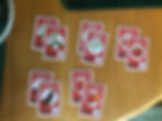 Anyone who has played Uno will recognize those symbols, and can probably infer what they mean. But assuming kids have played a game is a dangerous assumption. It'd be better to have everything clearly laid out in the rules.