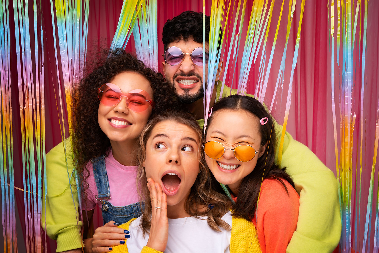 medium-shot-friends-posing-photo-booth (1).jpg