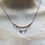 Thumbnail: "Golden Crescent Frange: 14kt GF Crescent Tube and Silver Fringe Necklace
