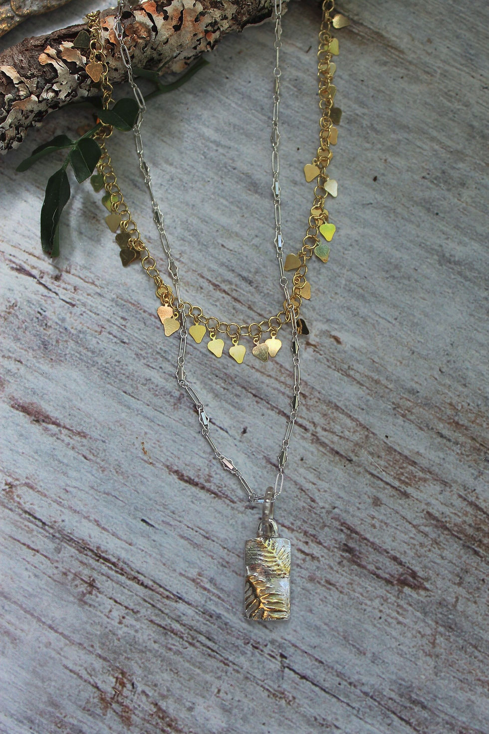 Thumbnail: Sunlit Palm Whisper: Sterling Silver Reversible Necklace