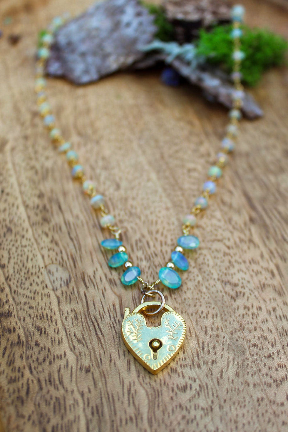 Thumbnail: "Éclat d’Opale" Gold Heart with Ethiopian Opals Necklace