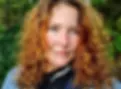 Tina LaBonte close up with a forest background