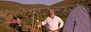 Don Rolfs in sagebrush hills with research equipment