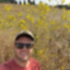 Kyle withn flowers.JPEG