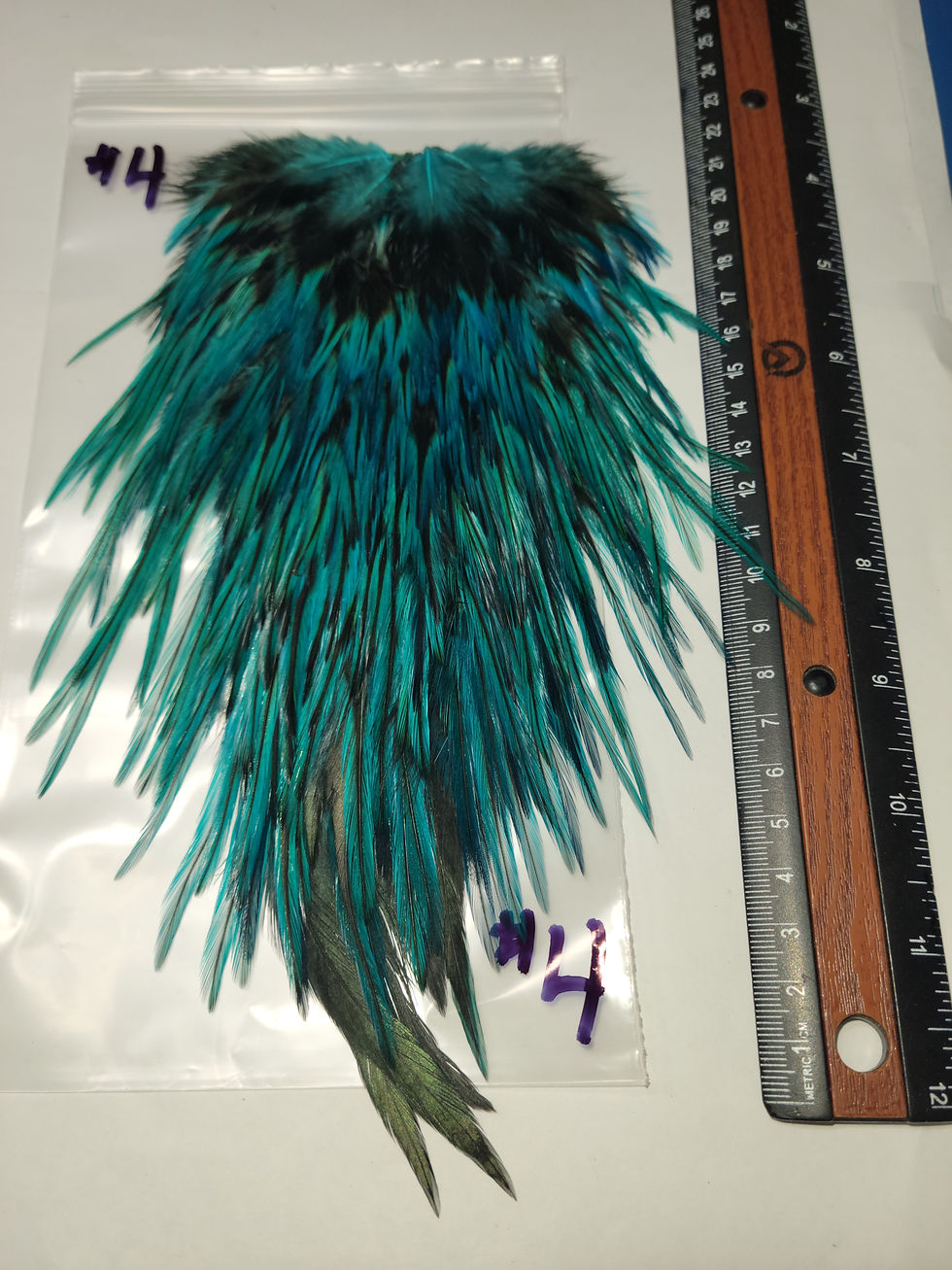 Thumbnail: Our Super Select AAA Blue Chill Dyed Badger Rooster Saddles