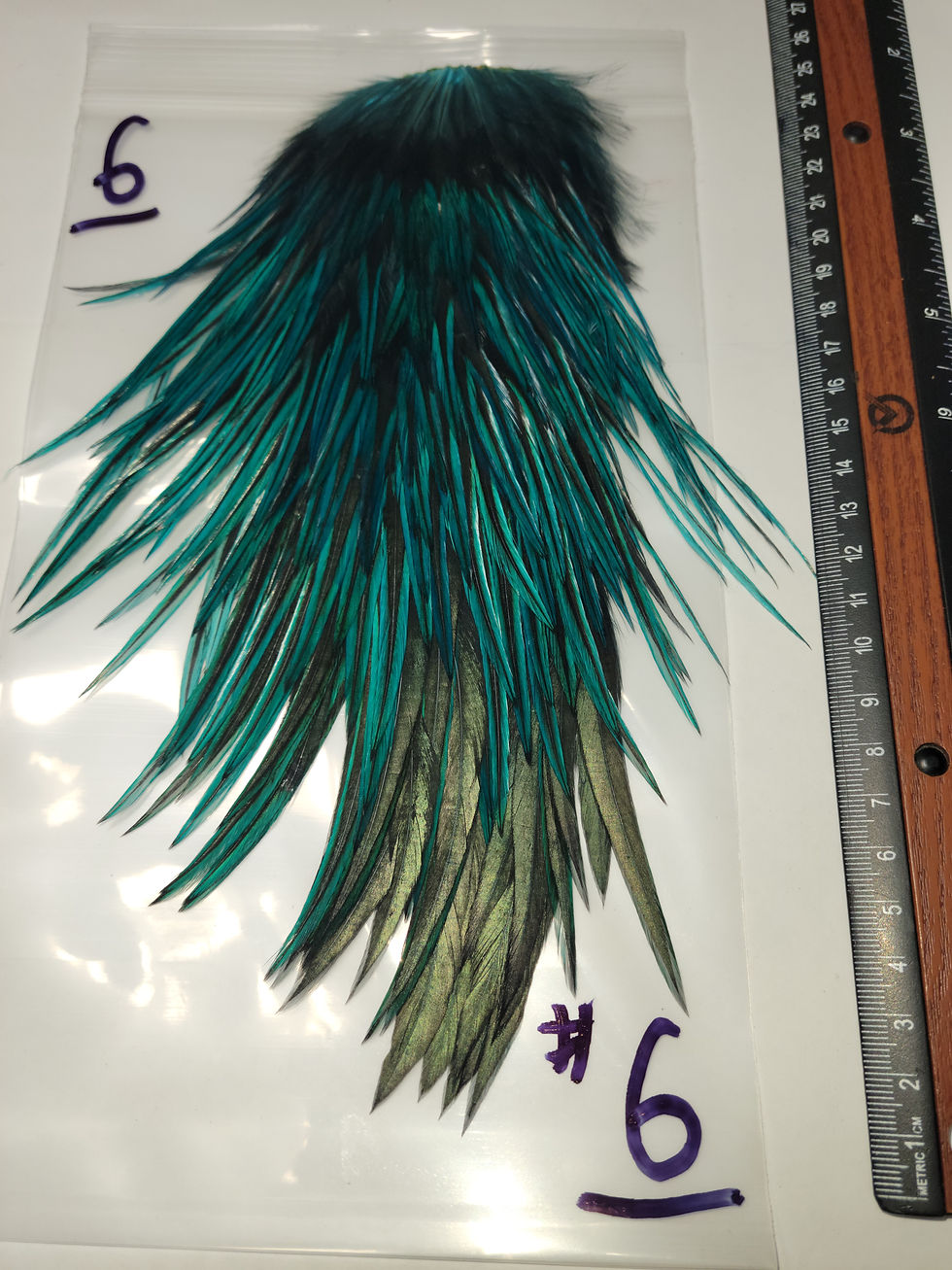 Thumbnail: Our Super Select AAA Blue Chill Dyed Badger Rooster Saddles
