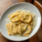 Ravioli ripieni di Burrata e Tartufo con Burro e Salvia