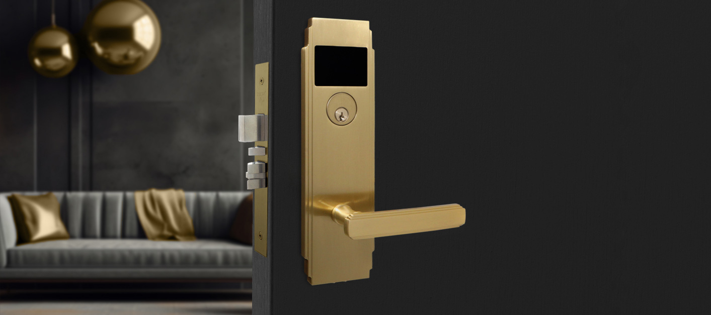 INOX Art Deco smart mortise keypad lock in aged brass installed on a dark architectural door