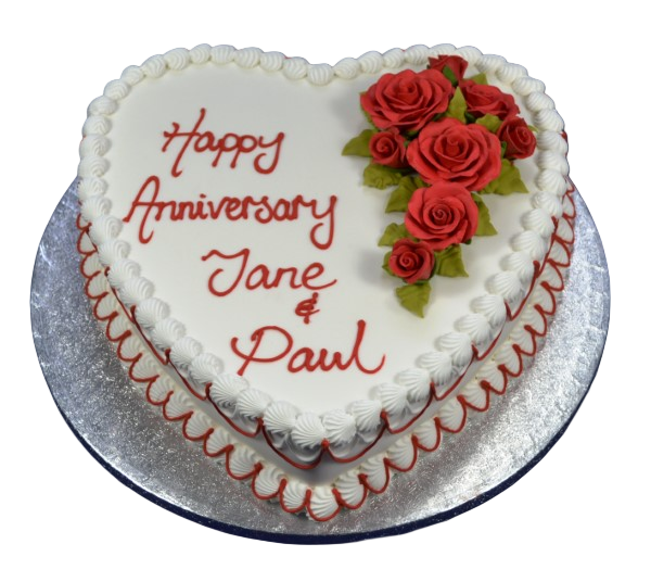 Bespoke heart-shaped cake adorned with red rose decorations for celebration in Solihull, West Midlands.