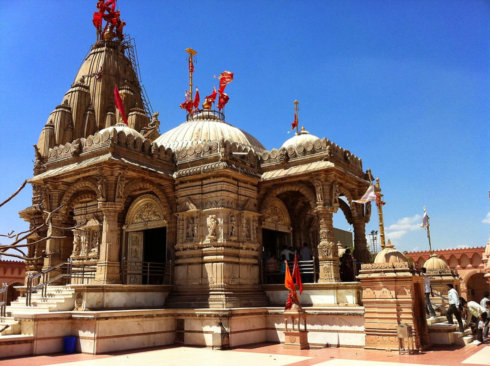 The hilltop temple, perched on Shankaracharya Hill, against a backdrop of blue skies and lush greenery.