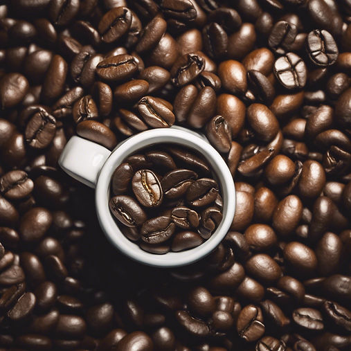 whole coffee beans along side mug.jpg