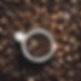 whole coffee beans along side mug.jpg