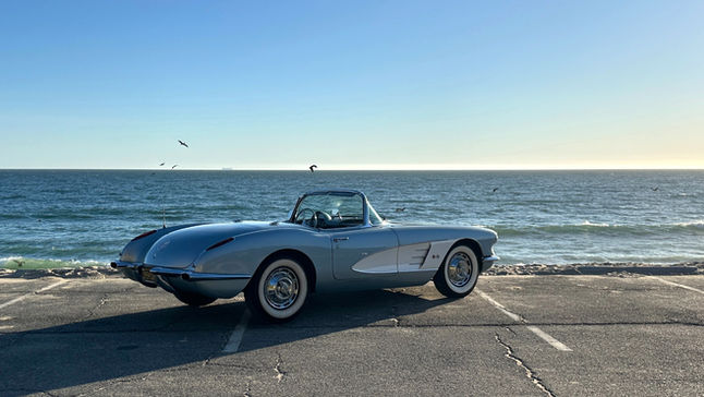 Classic convertible picture car parked along the Malibu California coast available for rent from Malibu Autobahn