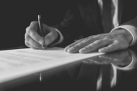 signing-legal-document-bw.jpg