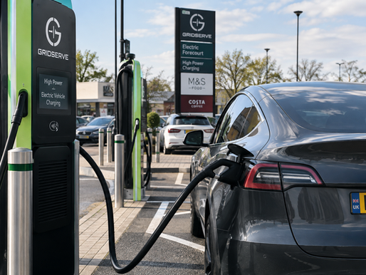 an electric car charging at a vehicle charging station