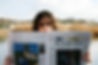 woman reading a newspaper