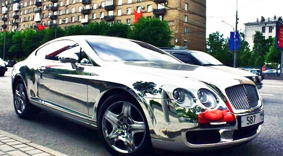 Image showing a chrome wrapped car used in a blog post about chrome car wraps by Auto Wrap Centre Liverpool