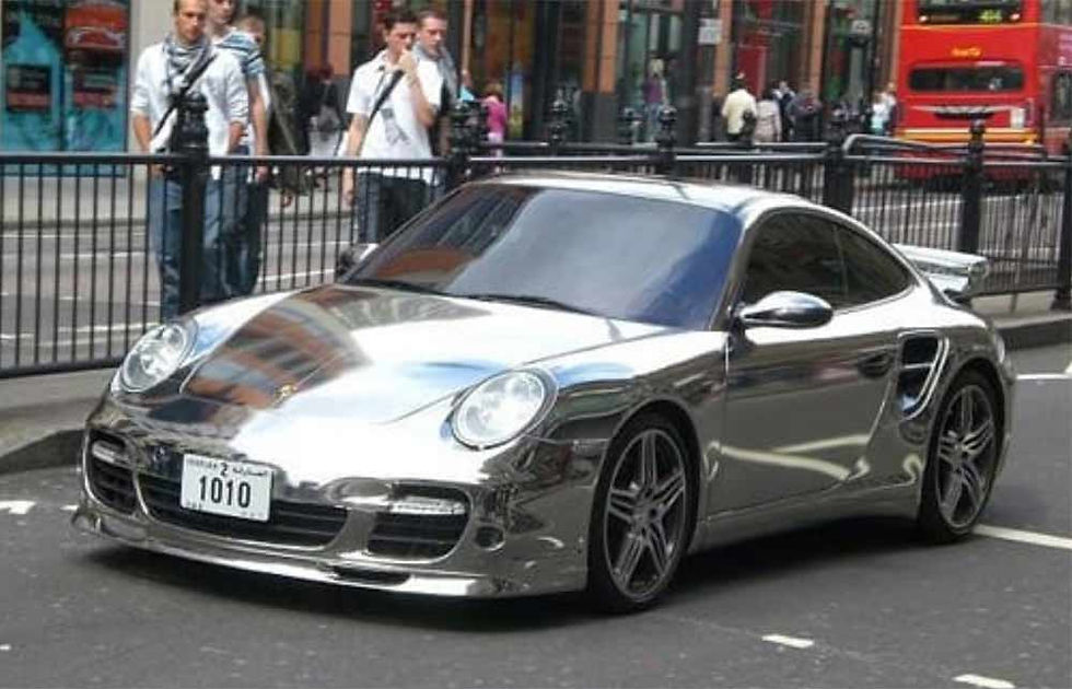 Image showing a chrome wrapped Porsche used in a blog post by Auto Wrap Centre Liverpool about chrome car wraps and chrome wrapping film