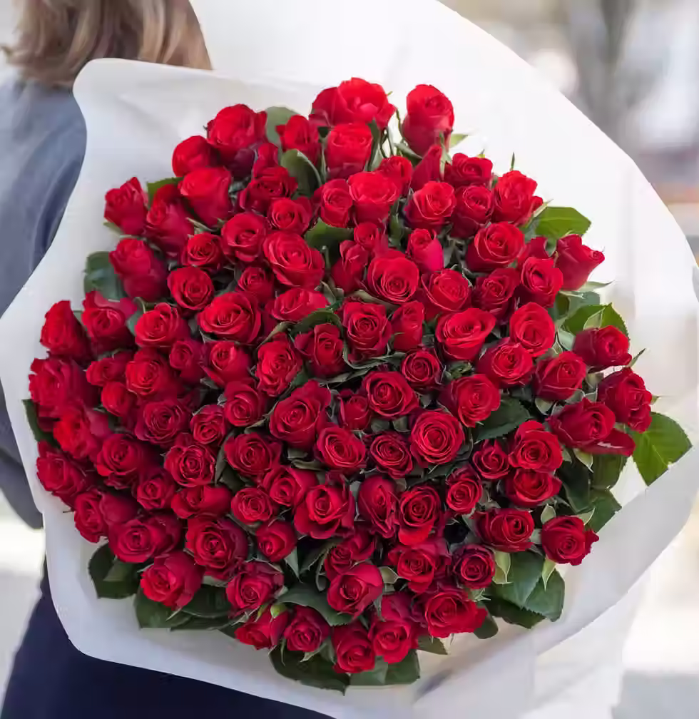 Classic red rose bouquet with fresh premium roses in an elegant arrangement.