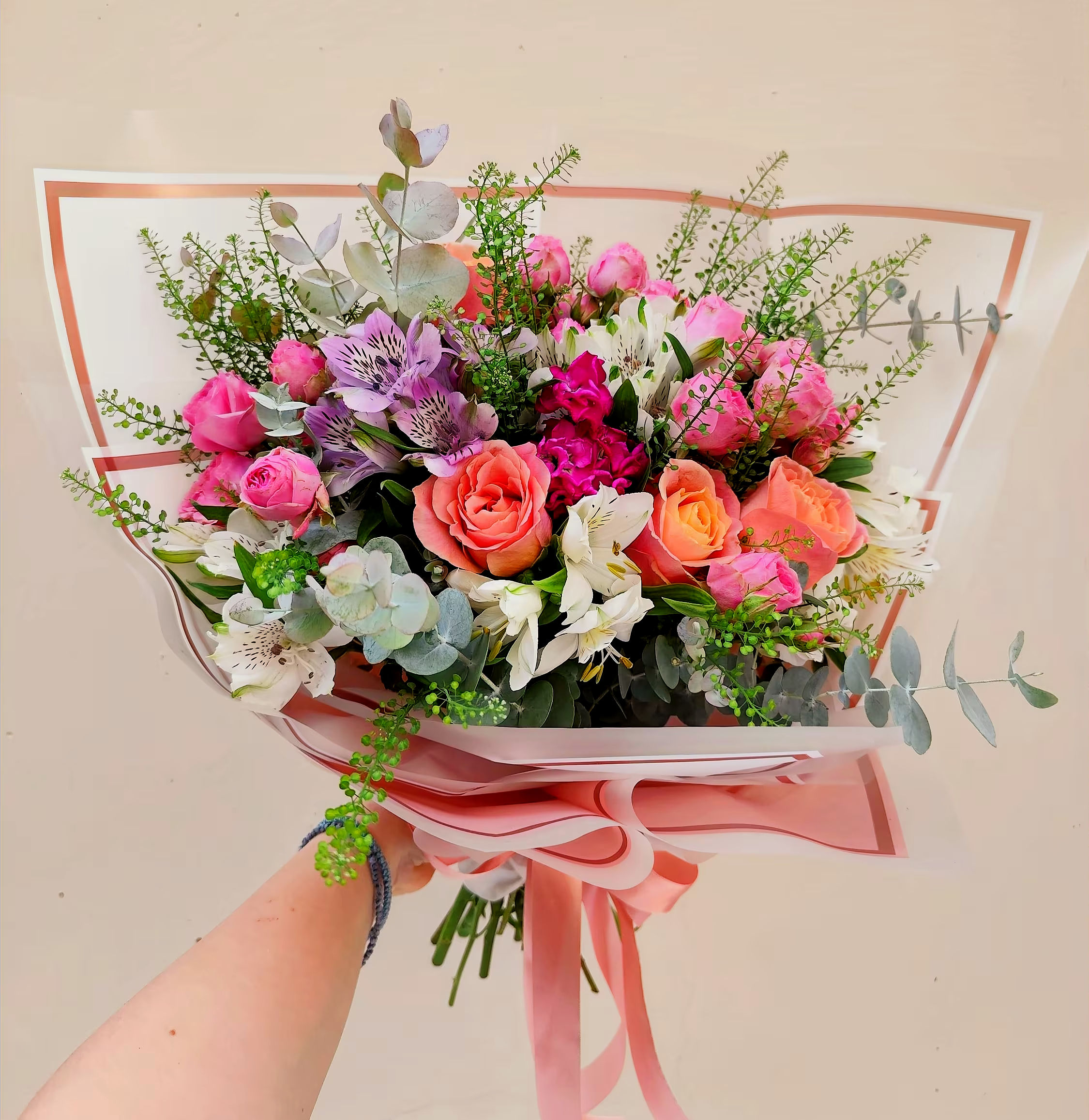 Celebration Bouquet with fresh roses, mini roses, alstroemeria and seasonal greenery
