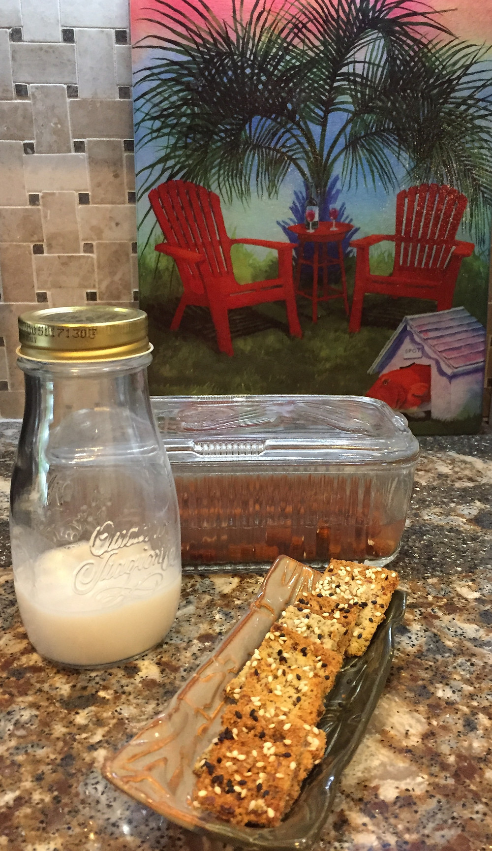 what is left of almond milk, almond crackers, and new batch in the making