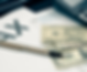 Tax form, pen, and cash: financial planning