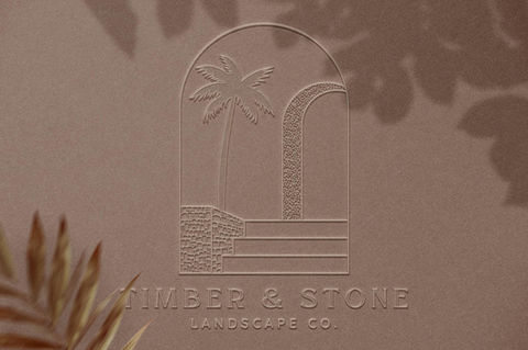 a logo for timber & stone landscape co. with a palm tree