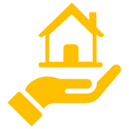 Une main tenant un bâtiment