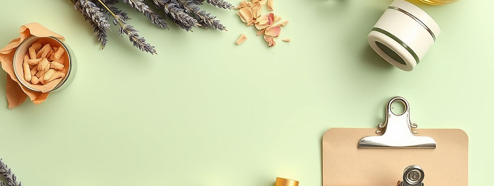A clean, elegant flatlay on a pastel green or beige background featuring essential oil bot