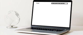 A professional flat lay image fa laptop screen showing a clean website interface. The back