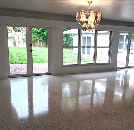 Shiny terrazzo floor in bright living room
