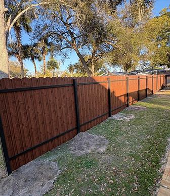 Wood privacy fence installation for residential property in Florida