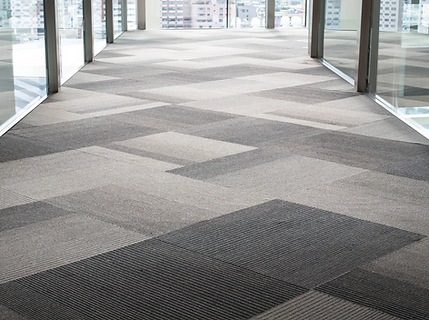 Modern office hallway with geometric carpet