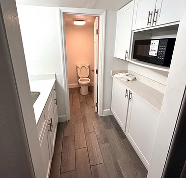 Private bathroom inside kitchenette extended stay suite